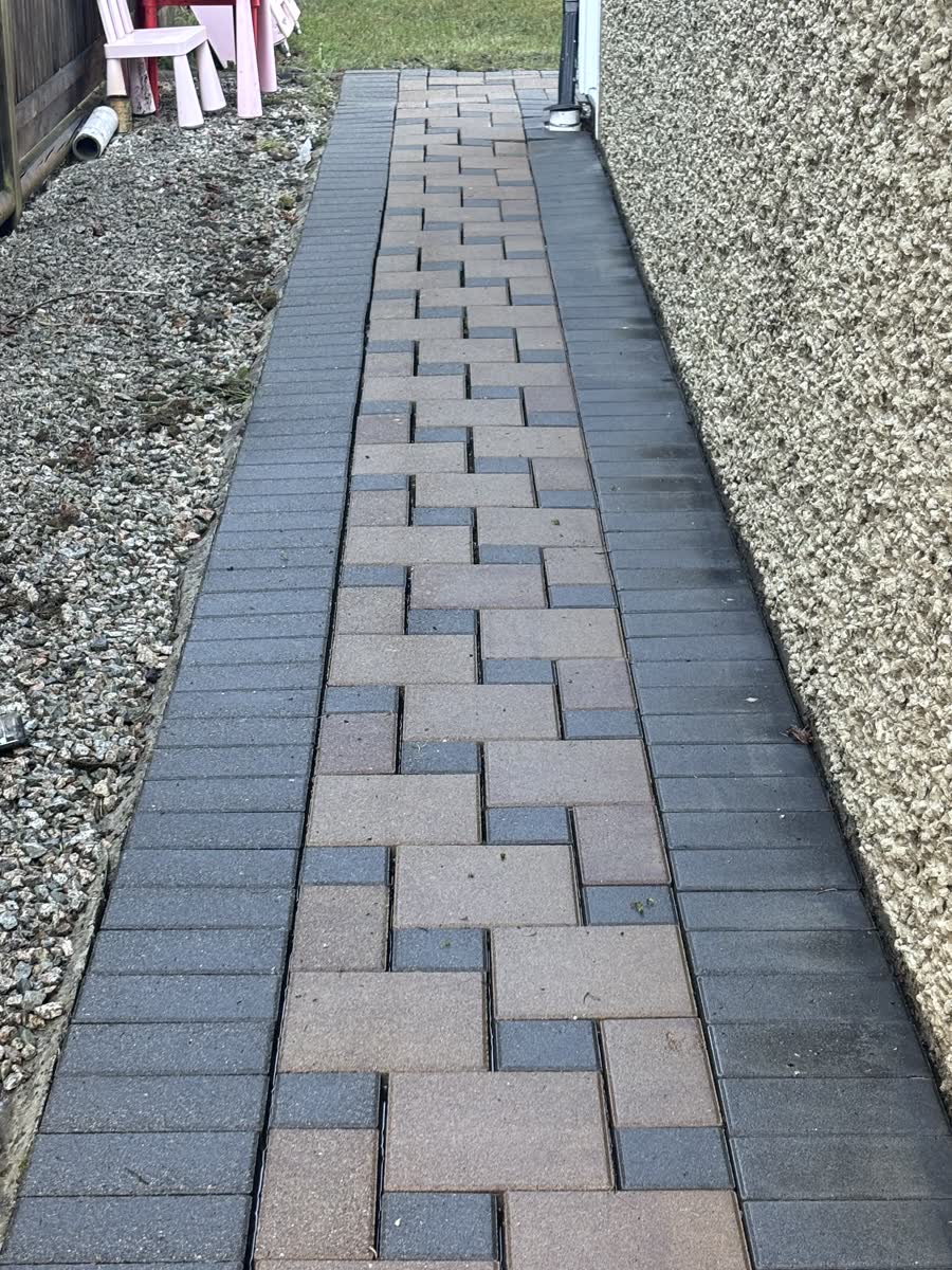 The same paver walkway after cleaning, moss removed and colour restored